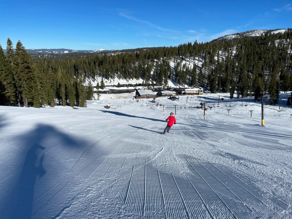 Skiing down to the base area on Gentle Ben at Dodge Ridge, January 2022