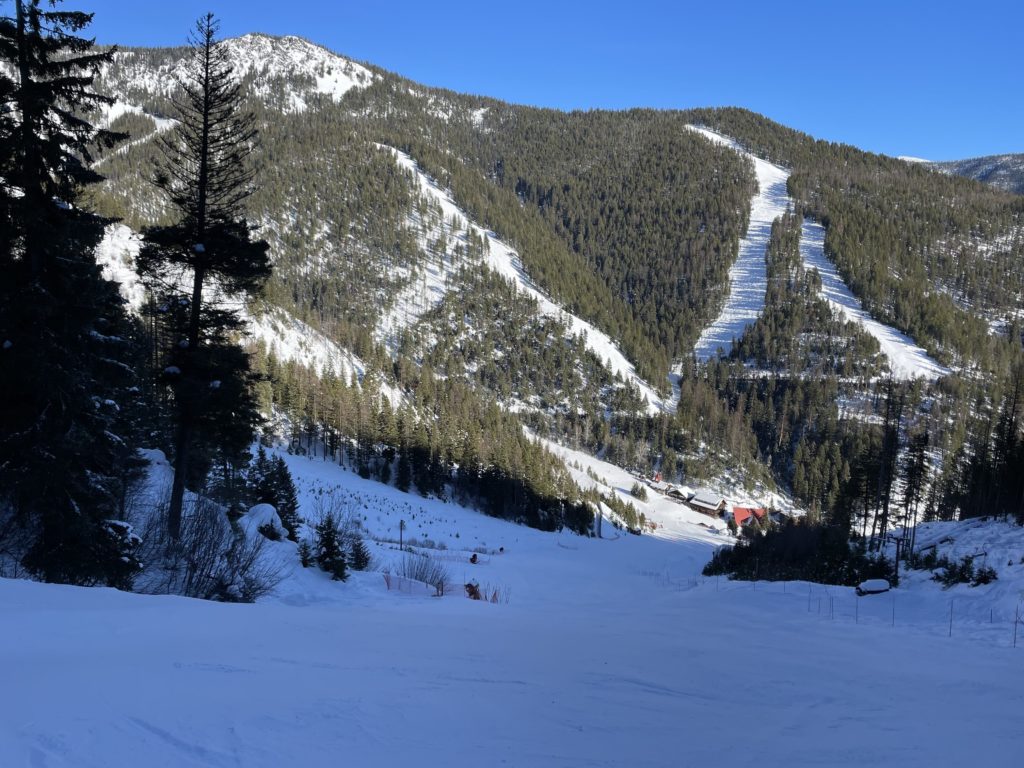 View to base area from the T-bar at Montana Snowbowl, January 2022
