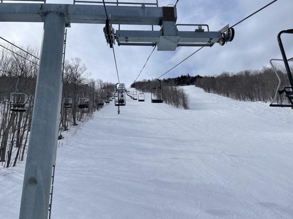 The Little Whiteface double chair shares towers with the Mountain Run chair on the lower half - March 2023