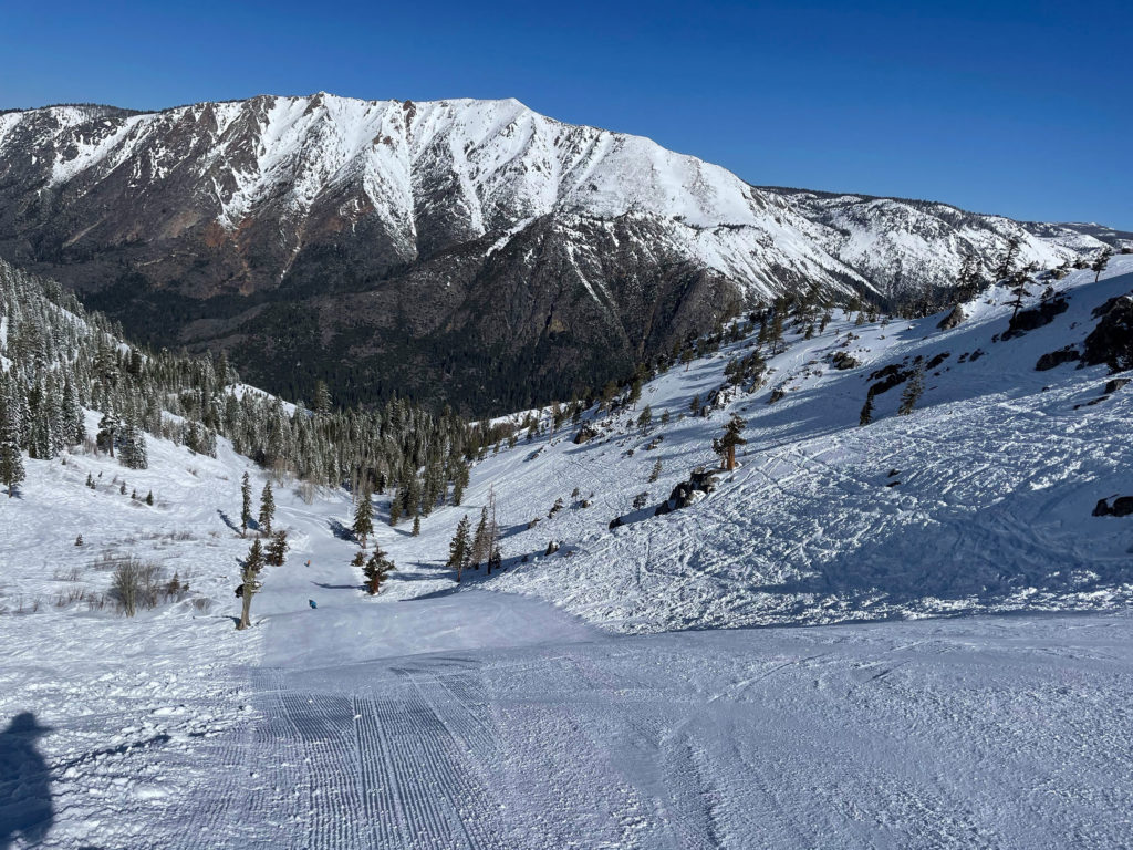 Snow Valley off the Grizzly chair is groomed when conditions make it possible, April 2025